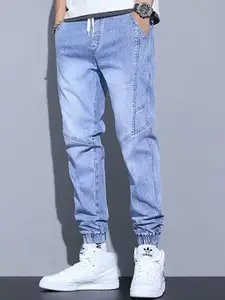 StyleCast x Revolte Men Relaxed Fit Mid-Rise Light Fade Jeans