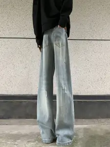 StyleCast x Revolte Men Mildly Distressed Light Fade Jeans