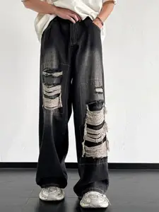 StyleCast x Revolte Men Wide Leg Mildly Distressed Light Fade Jeans