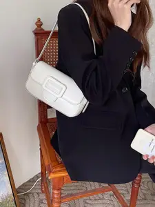 StyleCast x Revolte Structured Satchel