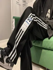 StyleCast x Revolte Men Striped Joggers