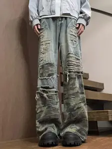 StyleCast x Revolte Men Highly Distressed Light Fade Mid-Rise Wide Leg Jeans