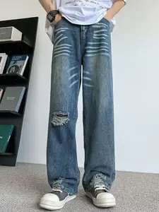 StyleCast x Revolte Men Wide Leg Mildly Distressed Jeans