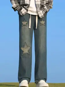 StyleCast x Revolte Men Wide Leg Mildly Distressed Jeans