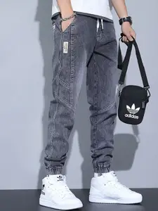 StyleCast x Revolte Men Relaxed Fit Light Fade Mid-Rise Jeans