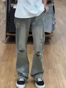 StyleCast Men Flared Mildly Distressed Heavy Fade Jeans