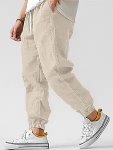 StyleCast x Revolte Men Cotton Mid-Rise Easy Wash Joggers Trousers