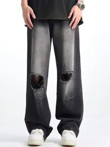 StyleCast x Revolte Men Relaxed Fit Slash Knee Light Fade Jeans