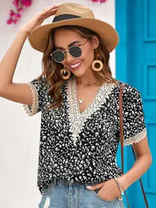 StyleCast x Revolte Floral Printed V-Neck Lace-Up Top