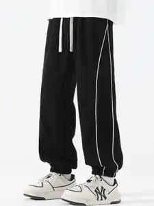 StyleCast x Revolte Men Solid Loose Fit Joggers Trousers