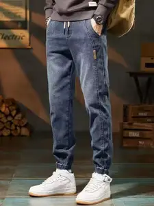 StyleCast x Revolte Men Jogger Fit Medium Shade Jeans