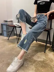 StyleCast x Revolte Women Slim Fit Mid-Rise Low Distress Light Fade Stretchable Jeans