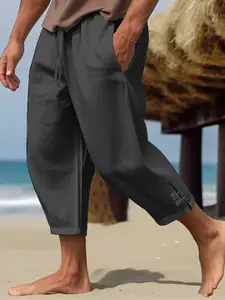 StyleCast x Revolte Men Solid Mid-Rise Cigarette Loose Fit Trousers