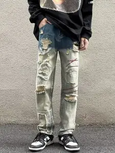 StyleCast x Revolte Men Highly Distressed Light Fade Jeans