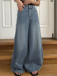 bebe Light Wash Denim High Rise Wide Leg Jeans
