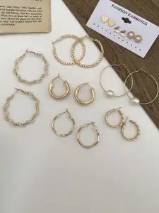 Celestique Set Of 9 Circular Shaped Studs