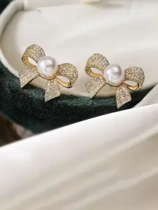 Celestique Pearls & Zircon Studded Bow Shaped Studs