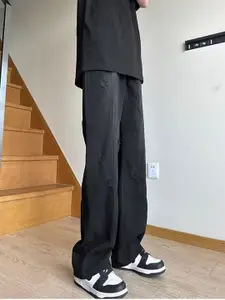 StyleCast Men Flared Mildly Distressed Light Fade Jeans