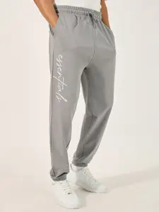 Styli Men Printed Pure Cotton Mid Rise Oversized Jogger With Placement Print