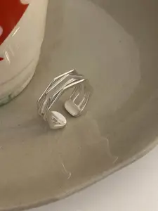 StyleCast Elegant Silver Toned Silver-Plated Adjustable Finger Ring