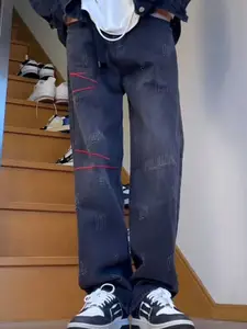 StyleCast x Revolte Men Relaxed Fit Light Fade Jeans