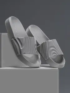 Red Tape Men Self Design Rubber Sliders