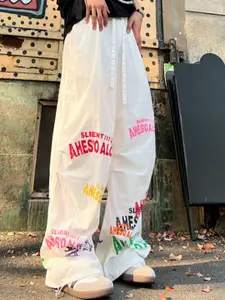 StyleCast x Revolte Men Printed Loose Fit Pleated Parachute Trousers