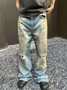 StyleCast x Revolte Men Relaxed Fit Mid-Rise Slash Knee Light Fade Jeans