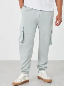 Styli Men Pure Cotton Relaxed Fit Mid Rise Cargo Joggers With Elasticated Hem