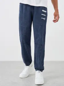 Styli Men Graphic Print Relaxed Fit Wide Leg Joggers