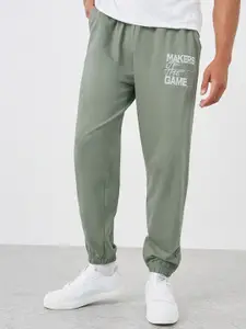 Styli Men Placement Print Cotton Oversized Fit Joggers With Elasticated Hem