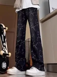 StyleCast x Revolte Men Flared Mid-Rise Light Fade Printed Cotton Jeans