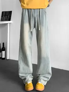 StyleCast x Revolte Men Relaxed Fit Mid-Rise Light Fade Jeans