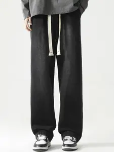 StyleCast x Revolte Men Relaxed Fit Mid-Rise Light Fade Jeans