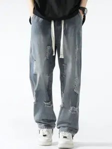 StyleCast x Revolte Men Relaxed Fit Mid-Rise Mildly Distressed Light Fade Jeans