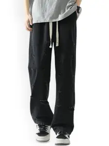 StyleCast x Revolte Men Relaxed Fit Mid-Rise Mildly Distressed Light Fade Jeans