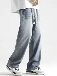 StyleCast x Revolte Men Relaxed Fit Mid-Rise Light Fade Jeans