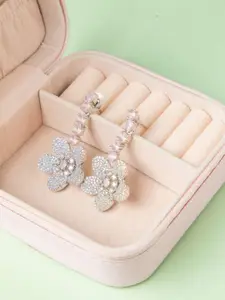 Niscka Rhodium-Plated American Diamond Studded Floral Shaped Drop Earrings