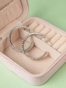 Niscka Rhodium-Plated American Diamond Studded Circular Shaped Half Hoop Earrings