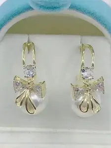 Celestique Pearls Beaded And Studded Crescent Shaped Half Hoop Earrings