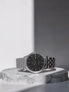 Titan Men Black Dial Watch 1584SM04