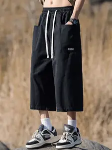 StyleCast x Revolte Men Loose Fit Mid-Rise Rapid-Dry Shorts