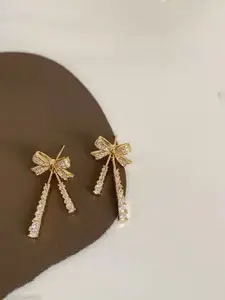 Celestique Cubic Zirconia Studded Bow Shaped Drop Earrings
