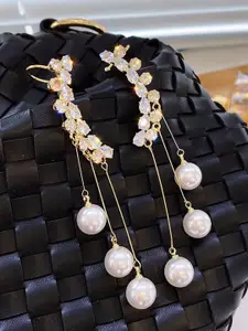 VAGHBHATT Korean Gold-Plated Artificial Stones Studded & Pearls Beaded Tasselled Ear Cuff