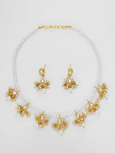 aadita Kundan Studded And Beaded Necklace And Earrings