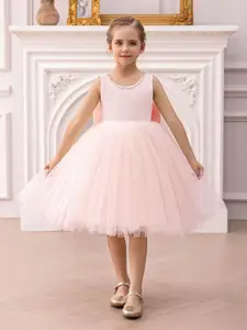 INCLUD Girls Peach Duchess Satin Tulle Overlay Party Dress with Statement Back Bow