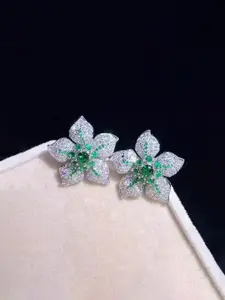 Jewels Galaxy Silver-Plated American Diamond Studded Floral Shaped Studs