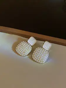 VAGHBHATT Gold-Plated Mother Of Pearls Studded and Pearls Beaded Drop Earrings