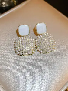 VAGHBHATT Gold-Plated Mother Of Pearls Studded and Pearls Beaded Drop Earrings