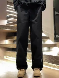 StyleCast x Revolte Men Solid Mid-Rise Regular Fit Trousers